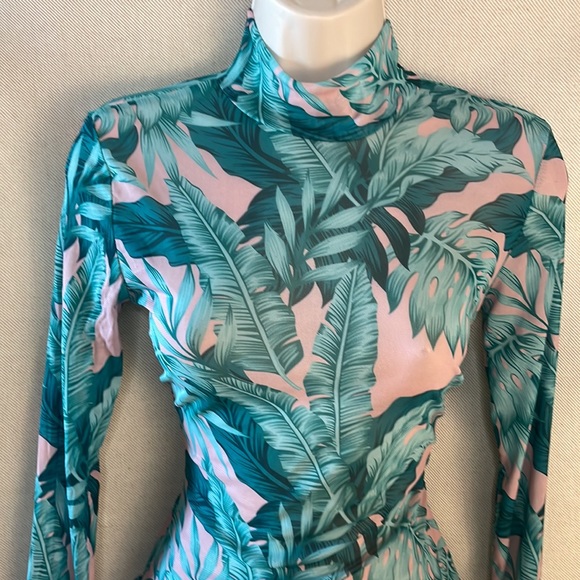 be the center of attention in this stunning sheer/floral print bodysuit - Picture 3 of 7